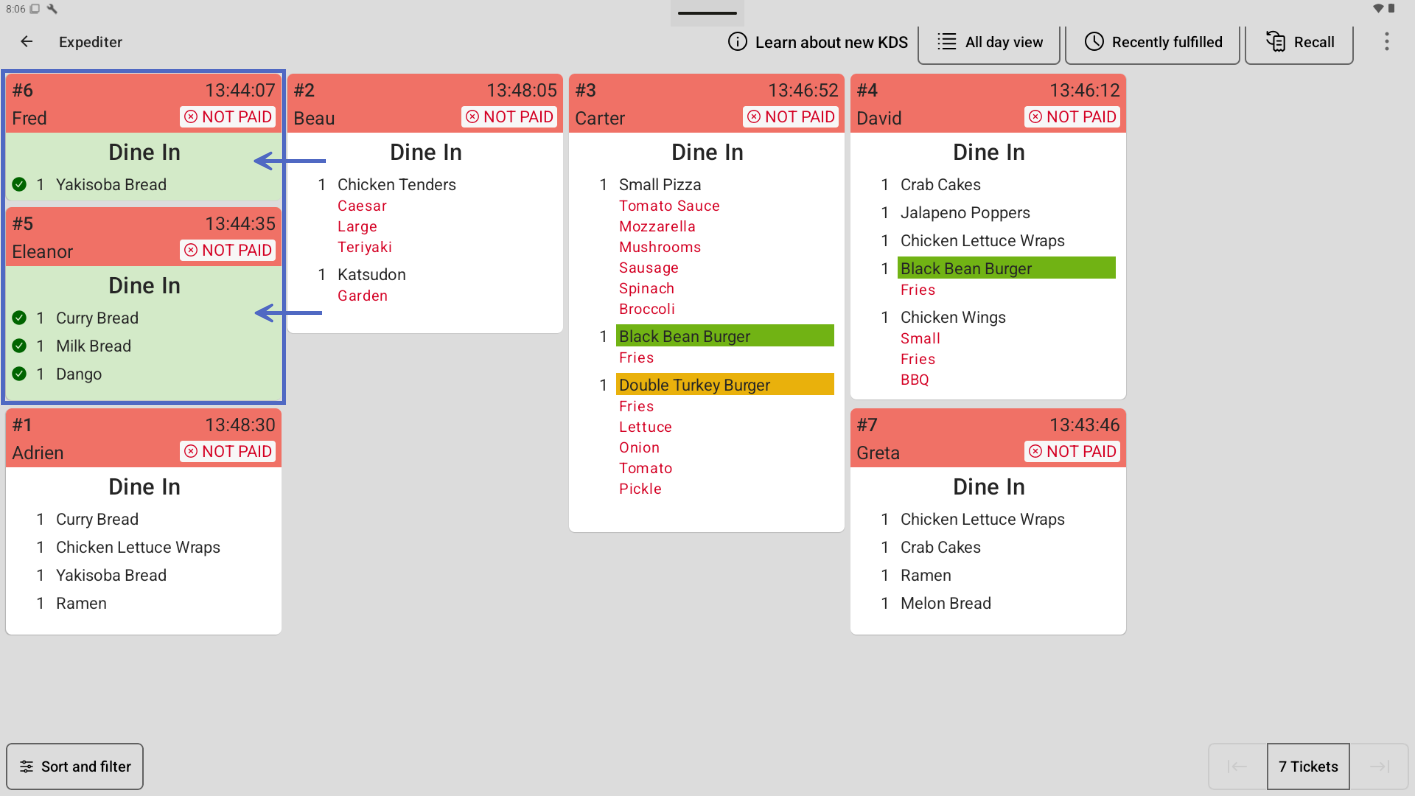 The KDS device with tickets grouped by fulfilled tickets first.