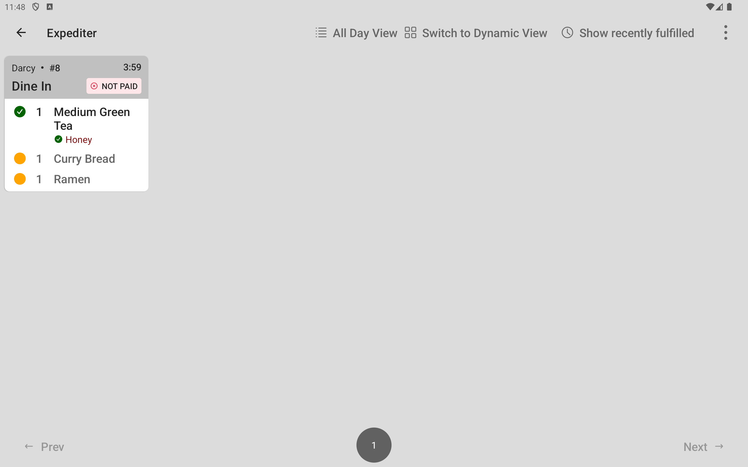The expediter KDS device showing a ticket with the Drinks prep station item fulfilled.