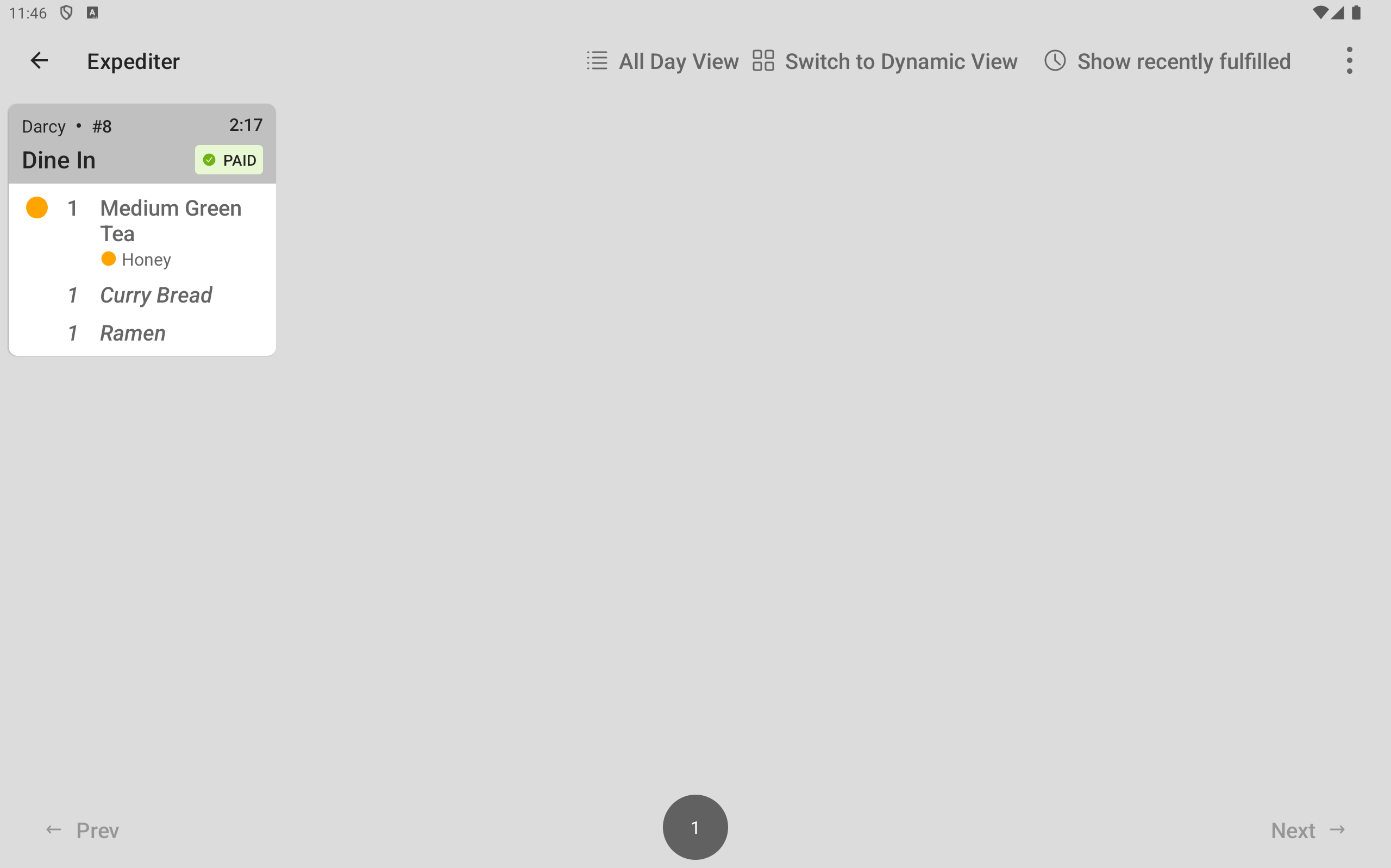 The expediter KDS device showing a ticket with the started Drinks prep station item which has the partial fulfillment icon.