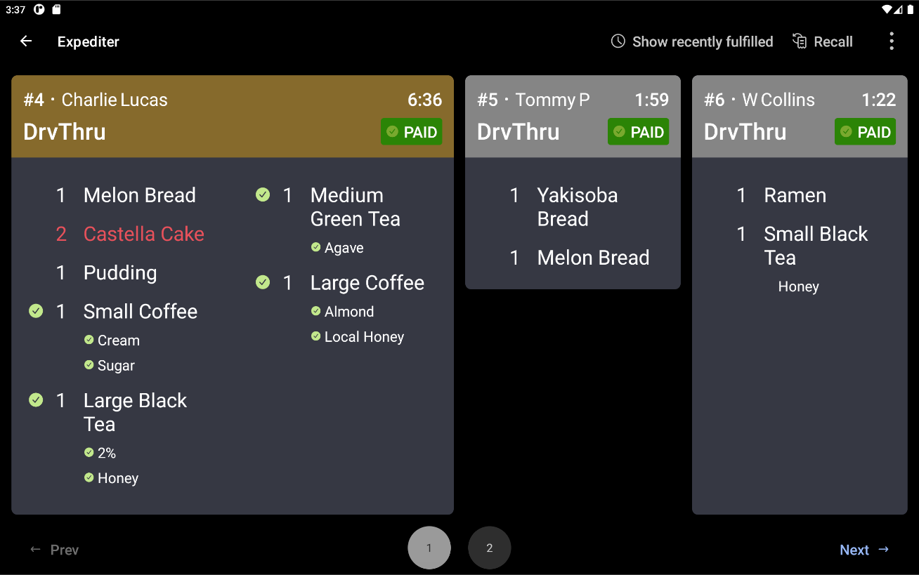 An example of grid view on a KDS device using dark mode.